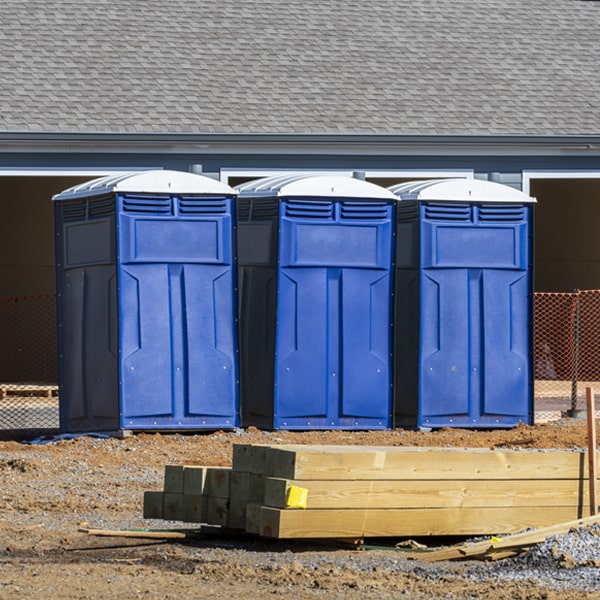 what is the cost difference between standard and deluxe portable toilet rentals in Lake Don Pedro